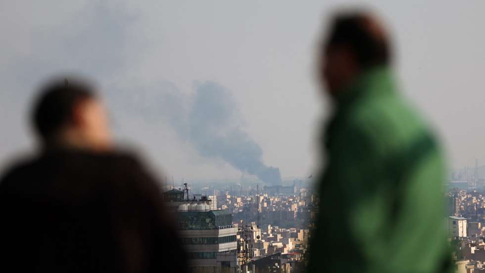 epa12864811 Smoke rises after an airstrike in central Tehran, Iran, 01 April 2026. A joint Israeli and US military operation, launched on 28 February, continues to target multiple locations across Iran.  EPA/ABEDIN TAHERKENAREH