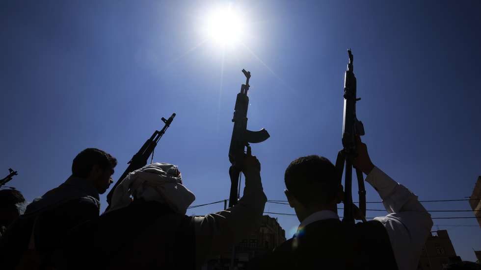 epa13286971 Houthi fighters hold up their weapons during a campaign to mobilize more fighters, in Sana'a, Yemen, 07 October 2026. As fighting between the Houthis and the Saudi-led coalition escalates, the head of Yemen's internationally recognized government, Rashad al-Alimi, announced in an address on 04 October the launch of military operations to retake remaining territory held by the Houthis.  EPA/YAHYA ARHAB