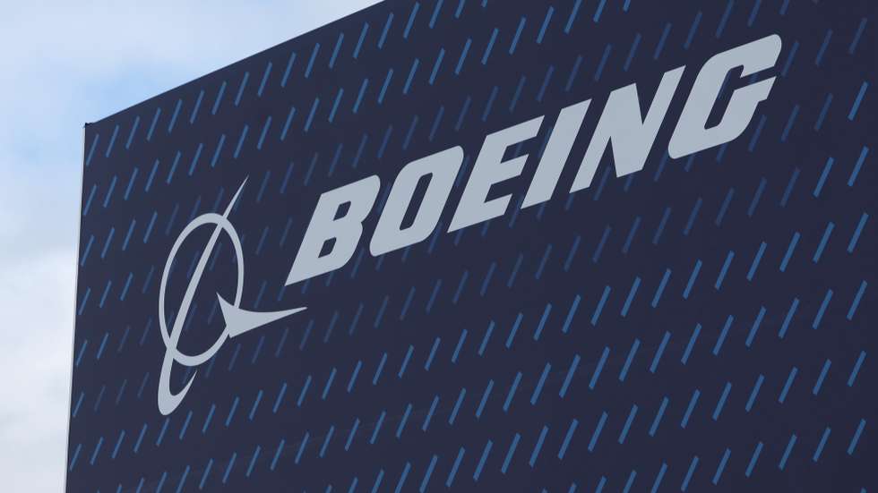 epa11491586 The Boeing logo is pictured on the opening day of the Farnborough International Airshow in Farnborough, Britain, 22 July 2024. The aviation summit is typically a platform for planemakers to rack up multibillion-dollar deals. The airshow runs from 22 to 26 July.  EPA/NEIL HALL
