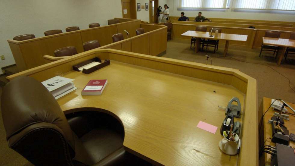 epa000271141 A photograph of the empty court room at the US Pioneer Kaserne, Hanau, Germany, Wednesday 8 September 2004. The court room is the site of the pre-trial hearing of US soldier Rogelio M. Maynulet who is accused of murdering an Iraqi man. Maynulet supposedly shot and killed the apparently already injured man from a short distance. Photographs of the accused were not yet allowed.  EPA/Boris Roessler