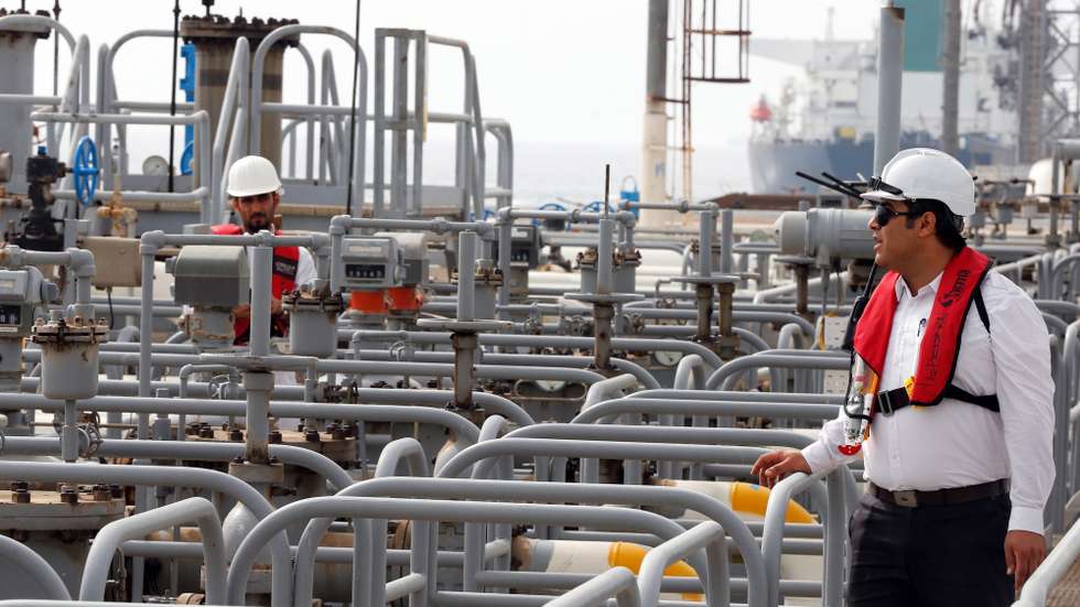 epa07137062 (FILE) Iranian technicians work at the Kharg oil  terminal at the Kharg Island, in Persian Gulf, southern Iran, 12 March 2017 (reissued 02 November 2018). The US government on 02 November 2018 announced it will reimpose sanctions that had been waived under the Iran nuclear deal. Five nations including the United States worked out a deal with Iran in 2015 that withdrew sanctions.  EPA/ABEDIN TAHERKENAREH