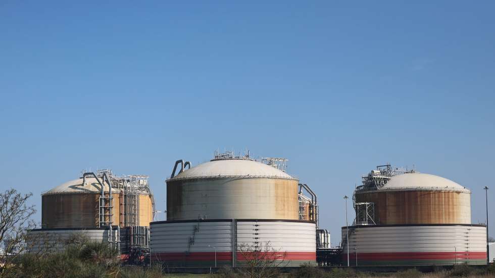 epa12833417 Storage tanks at Grain LNG, Europe's largest liquefied natural gas terminal on the Isle of Grain, Britain 19 March 2026. Global gas and oil prices have risen following attacks by Israel and Iran on refineries in the Middle East as the conflict continues. European leaders have announced they were ready to join “appropriate efforts” to reopen the Strait of Hormuz, where Iran has attacked ships to effectively close the shipping route.  EPA/NEIL HALL