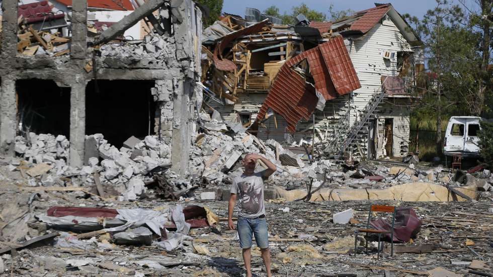 epaselect epa10127654 A local man inspects debris of private buildings and recreation center after a recent rocket hit in Zatoka settlement near the South Ukrainian city of Odesa, 18 August 2022, amid the Russian invasion. At least four people were injured, according to the State Emergency Service. Russian troops on 24 February entered Ukrainian territory, starting a conflict that has provoked destruction and a humanitarian crisis.  EPA/STR