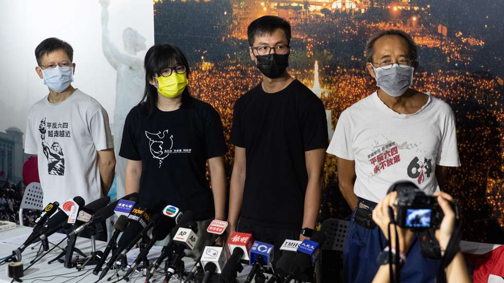 epa09454469 The vice-chairwoman of The Hong Kong Alliance in Support of Patriotic Democratic Movements in China Chow Hang-tung (2-L) and fellow alliance members Leung Kam-wai (2-R), and Tang Ngok-kwan (L), meet reporters in Hong Kong, China, 05 September 2021, (issued 08 September 2021). Chow, Leung, Tang and another core member of the alliance organizing Hong Kongâ€™s annual Tiananmen Square candlelit vigil were arrested early 08 September 2021, one day after officially refusing to cooperate with a national security investigation.  EPA/JEROME FAVRE
