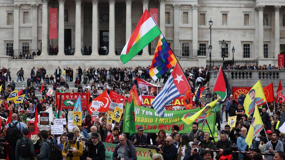 epa11312638 Workers from various nationalities and unions hold a May Day rally at Trafalgar Square in London, Britain, 01 May 2024. Labor Day, or May Day, is observed all over the world on the first day of May to celebrate the economic and social achievements of workers and advocate for their rights.  EPA/ANDY RAIN