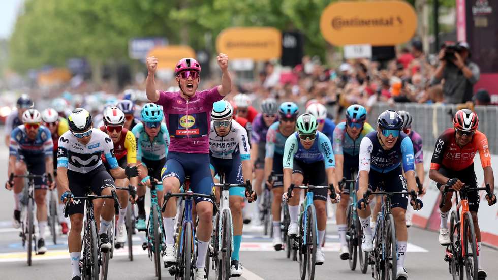 epa12091714 Danish rider Mads Pedersen (C) of team Lidl - Trek wins the third stage of the Giro d'Italia cycling tour over 160km from Vlore to Vlore, Albania, 11 May 2025.  EPA/GEORGI LICOVSKI