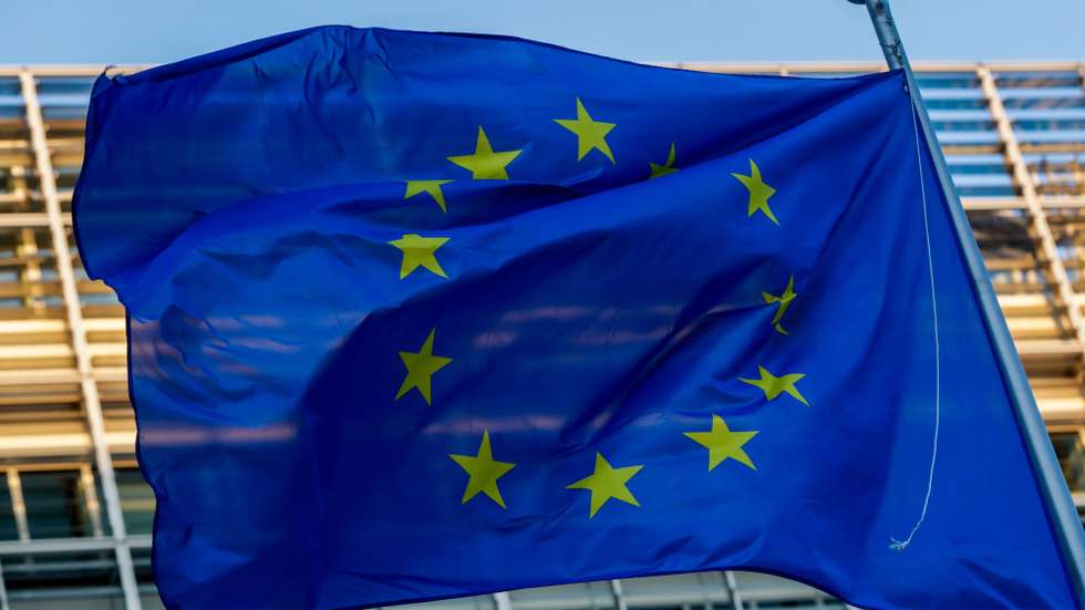epa08999148 A European flag is seen in front of the European Commission in Brussels, Belgium, 09 February 2021.  EPA/STEPHANIE LECOCQ
