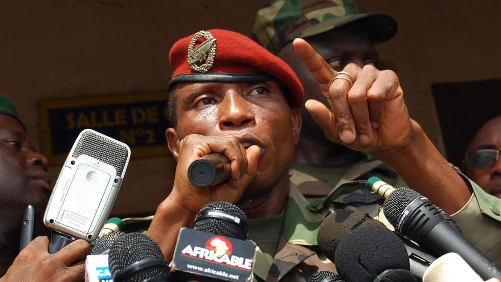 epa01954044 (File) A file photograph which was made available 29 September 2009 shows Guinea Junta head Capt Moussa Dadis Camara speaking to the media in Conakry, Guinea. According to media reports on 03 December 2009, Capt Camara has been allegedly shot at by one of his aides, but he "is well" and "out of danger".  EPA/STR *** Local Caption *** 00000401879863