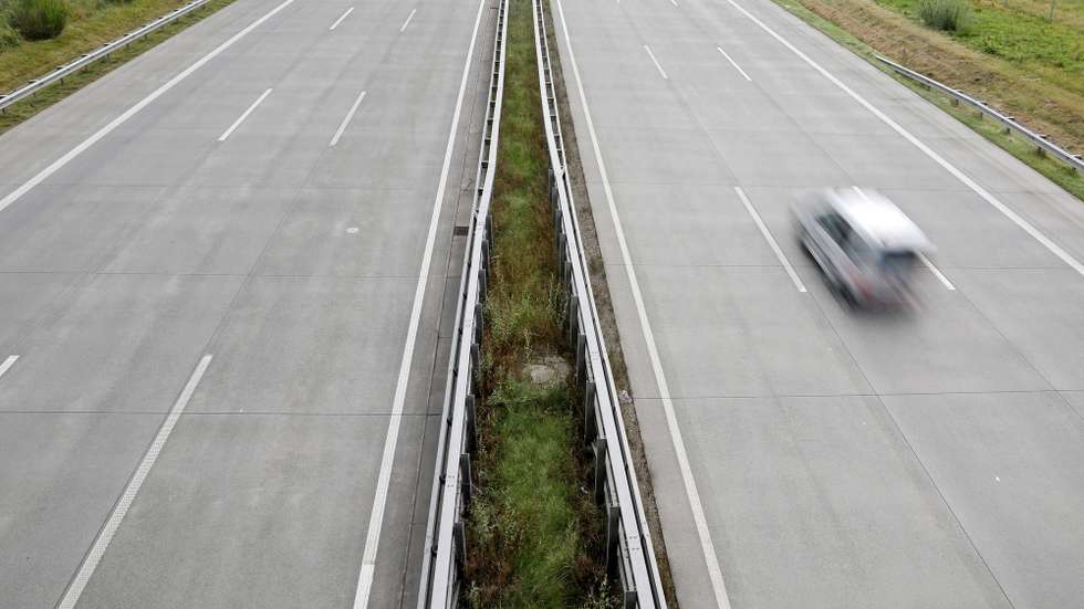 epa06171872 One car passes on the Autobahn A1 near Sottrum, northern Germany, 30 August 2017. The section of the so called 'Hansalinie' between Bremen and Hamburg is run by the private company A1 mobil as a public-private partnership. According to media reports, A1 mobil is threatened by bankruptcy as the revenues from the German LKW Maut (road charge for trucks) from this sections are lower than expected.  EPA/FOCKE STRANGMANN