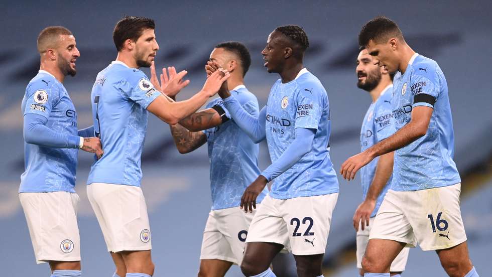 epa08849012 Manchester Cityâ€™s Benjamin Mendy (center R) celebrates with teammates after scoring against Burnley during the English Premier League soccer match between Manchester City and Burnley FC in Manchester, Britain, 28 November 2020.  EPA/Laurence Griffiths / POOL EDITORIAL USE ONLY. No use with unauthorized audio, video, data, fixture lists, club/league logos or 'live' services. Online in-match use limited to 120 images, no video emulation. No use in betting, games or single club/league/player publications.