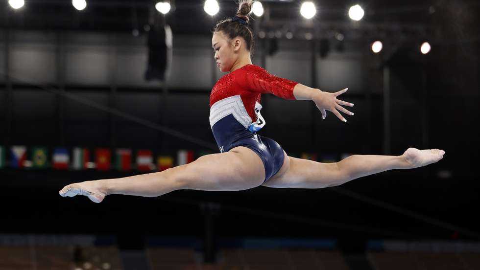 epaselect epa09370482 Sunisa Lee of the USA performs on the Balance Beam during the Women's Team final during the Artistic Gymnastics events of the Tokyo 2020 Olympic Games at the Ariake Gymnastics Centre in Tokyo, Japan, 27 July 2021.  EPA/HOW HWEE YOUNG