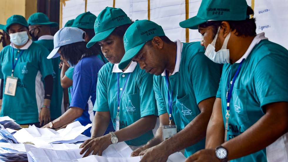 epa09835301 Election workers count votes at a polling station during the presidential election in Dili, East Timor, also known as Timor Leste, 19 March 2022. Incumbent President Francisco Guterres, and a Nobel Peace Prize laureate who is also a former president, Jose Ramos Horta are among the front-runners  EPA/ANTONIO DASIPARU