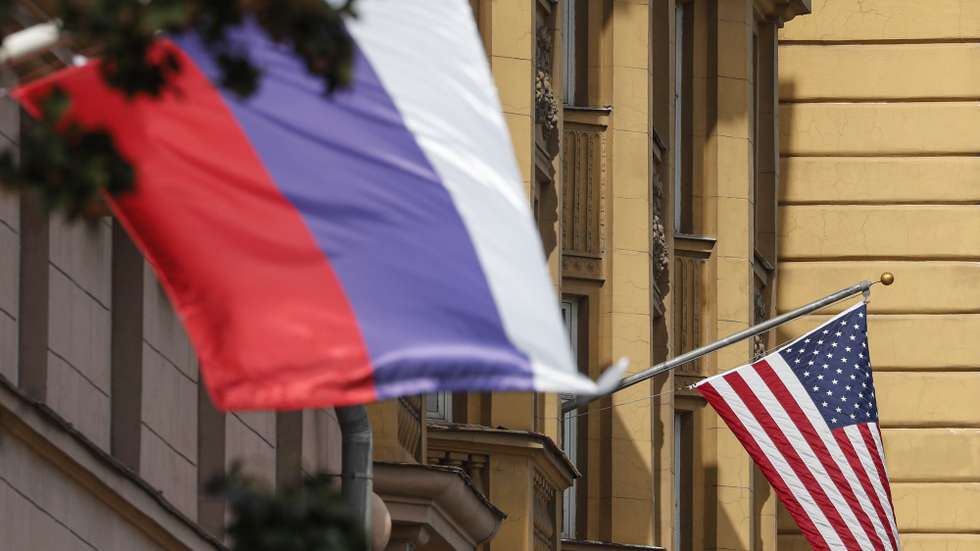 epa10825180 A Russian national flag is seen near the US embassy main building in Moscow, Russia, 28 August 2023. Robert Shonov, a former employee of the US Consulate General in Vladivostok, was detained as part of a case involving the collection of information about the mobilization, the course of a special military operation and the protest activity of Russians on the instructions of diplomats from the political department of the US embassy, Russia's Federal Security Service (FSB) reports. According to the FSB, from September 2022 until the moment of detention, Shonov, for a fee, 'performed the tasks of employees of the political department of the US Embassy in Moscow, Cillin Jeffrey and Bernstein David, to collect information on the progress of a special military operation, mobilization processes in the regions of Russia, on problematic moments and assess them influence on the protest activity of the population on the eve of the presidential elections in the Russian Federation in 2024'. The FSB said that it was planned to carry out interrogations of these American diplomats, in connection with which the corresponding agendas were sent to the US Embassy in Moscow.  EPA/MAXIM SHIPENKOV