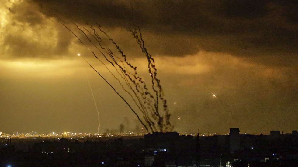epaselect epa10919505 Rockets are launched from the coast of the Gaza Strip towards Israel by militants of the Ezz Al-Din Al Qassam militia, the military wing of the Hamas movement, Gaza City, 14 October 2023. The Israeli Defense Force (IDF) on 13 October called for the evacuation of all civilians of northern Gaza ahead of an expected ground invasion. More than 1,300 Israelis have been killed and over 3,200 others injured, according to the IDF, after the Islamist movement Hamas launched an attack against Israel from the Gaza Strip on 07 October. More than 2,000 Palestinians have been killed and over 8,700 others injured in Gaza since Israel launched retaliatory air strikes, the Palestinian health ministry said.  EPA/MOHAMMED SABER