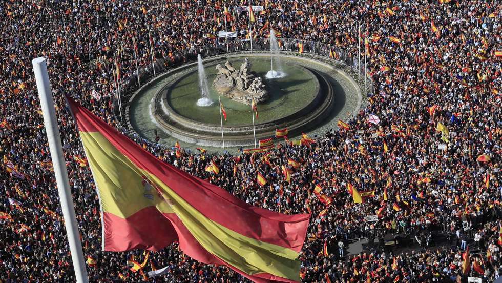epa10982240 Thousands of demonstrators take the streets of downtown Madrid on 18 November 2023 to protest against the government's decision to grant amnesty to Catalan separatist leaders. The deal struck with Junts Per Cat (JPC) (Together for Catalunya, in Catalonian) has allowed Spain's Prime Minister Pedro SÃ¡nchez to form a new minority coalition government following an inconclusive election in July. Junts is a group bent on achieving independence for the northeastern region of Catalonia and is headed by Carles Puigdemont, who fled Spain after leading an illegal secession bid in 2017 that brought the country to the brink.  EPA/FERNANDO ALVARADO