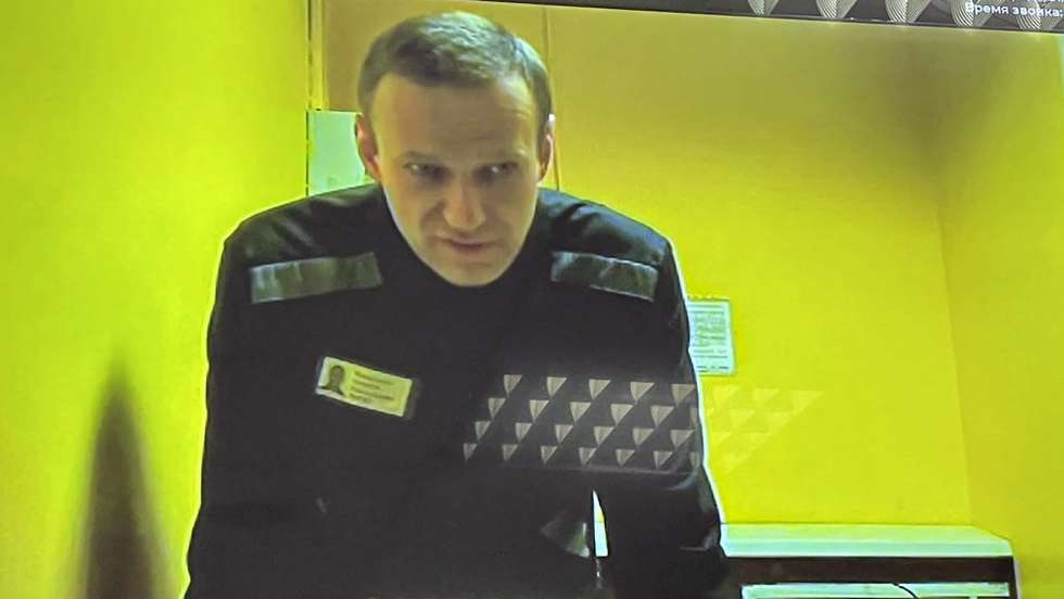 epa10664635 A handout photo made available by Moscow City court press service shows jailed Russian opposition figure Alexei Navalny attending via a video link from his penal colony a preliminary hearing of a new case in the Moscow City court in Moscow, Russia, 31 May 2023. A new case was initiated under six articles - on the organization of an extremist community. Navalny has been in the colony since February 2021, when the court, at the request of the Federal Penitentiary Service, replaced his suspended sentence in the Yves Rocher case of 2014 with a real one. He was supposed to serve in a penal colony for 2 years and 8 months, but in March 2022, the Lefortovo Court of Moscow, at an off-site meeting in correctional colony-2 in the city of Pokrov, Vladimir Region, sentenced the politician to 9 years of strict regime and a fine of 1.2 million rub., as well as one and a half years of restriction of freedom in the case of fraud and contempt of court. In June 2022, the sentence entered into force.  EPA/MOSCOW CITY COURT PRESS SERVICE/HANDOUT -- BEST QUALITY AVAILABLE -- HANDOUT EDITORIAL USE ONLY/NO SALES