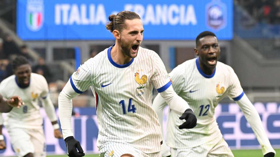 epa11726450 Franceâ€™s midfielder Adrien Rabiot (C) celebrates after scoring the opening goal during the UEFA Nations League soccer match between Italy and France at the Giuseppe Meazza stadium in Milan, Italy, 17 November 2024.  EPA/DANIEL DAL ZENNARO