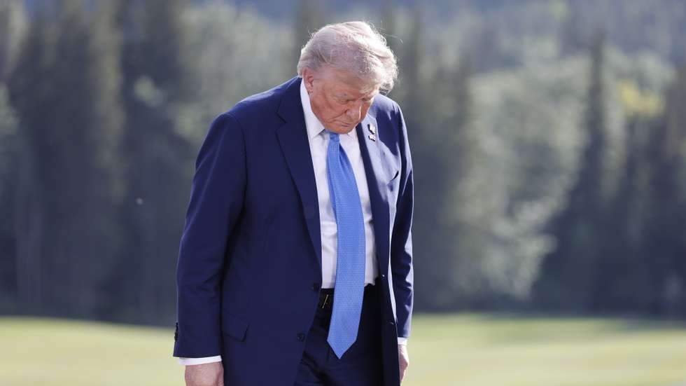 epa12180134 US President Donald Trump leaves after a family photo during the Group of Seven (G7) Summit at the Kananaskis Country Golf Course in Kananaskis, Alberta, Canada, 16 June 2025. World leaders are gathered from 15 to 17 June 2025 for the annual G7 Summit.  EPA/LUDOVIC MARIN / POOL