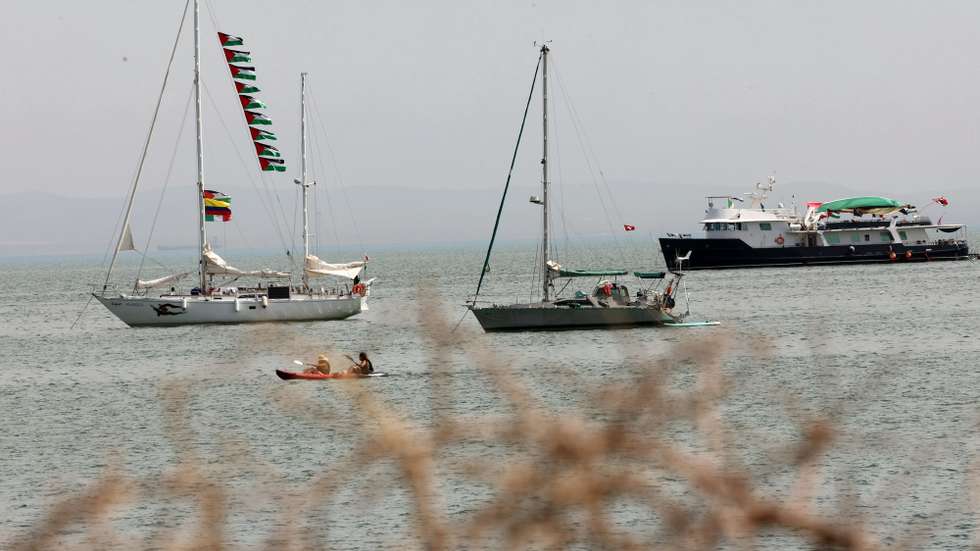 epa12364870 Vessels, part of the Global Sumud Flotilla, off the coast of Sidi Bou Said, one day after a drone attack on one of the humanitarian ships in Tunisian waters off Tunis, Tunisia, 09 September 2025. The Global Sumud Flotilla (GSF) for Gaza announced on 09 September that one of its main vessels was reportedly targeted by a drone while in Tunisian waters. The six people on board, both passengers and crew, were not injured. According to the WFTU statement, the ship, which sails under the Portuguese flag and carries the initiative's steering committee, suffered damage following a fire affecting the main deck and a storage area.  Tunisian authorities rejected the theory of an airstrike, saying that, according to a first inspection, the explosion that caused the fire probably started inside the ship.  EPA/MOHAMED MESSARA