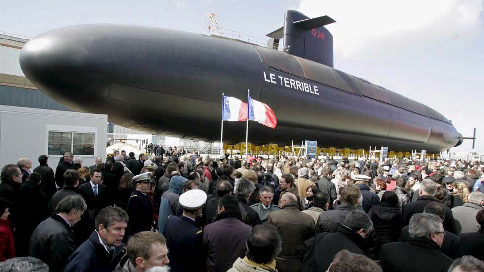 epa01293043 Launching ceremony of the nuclear powered missil-launching submarine ‘Le Terrible’, the first in the French Navy to be armed with the new ballistic missile M-51, with the presence of French President Nicolas Sarkozy, who delivered his first speech on nuclear deterrence where he stated that 'France will not lower the guard' and signaled his concern about Iran nuclear policies, at the shipyards of the DCNS, in Cherbourg, France, 21 March 2008. Le Terrible, that will enter in service in 2010, displaces 14.300 tons submerged and is the fourth  of her class built for the French Navy. Le Terrible has a length of 138 meters and a with of 12,5 m. She is manned by a crew of111, and her speed submerged is of 25 knots.  EPA/MAXPPP/JEAN YVES DESFOUX FRANCE OUT---BELGIUM OUT