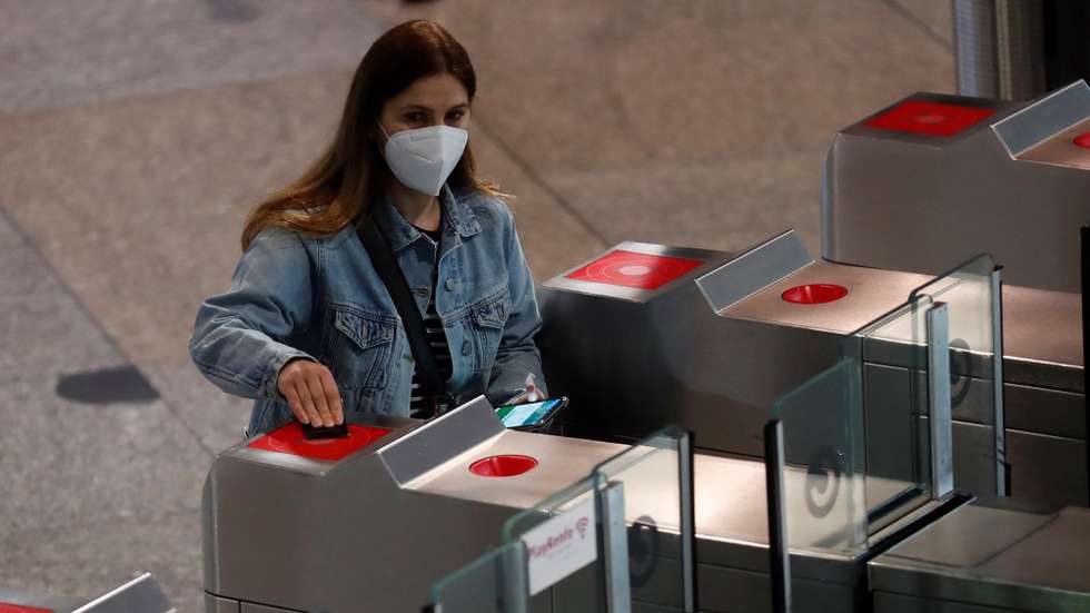 epa08399361 A womanwears a face mask, which is mandatory for the use of public transport, at Atocha subway station in Madrid, Spain, 04 May 2020. Spain is under a lockdown to avoid the spreading of pandemic of the COVID-19 disease caused by the SARS-CoV-2 coronavirus.  EPA/Chema Moya