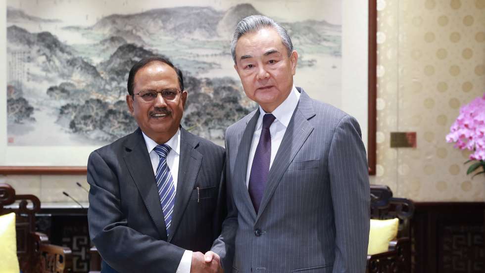 epa12193830 Chines Foreign Minister Wang Yi (R) meets with  India's national security adviser and special representative for the India-China boundary question Shri Ajit Doval in Beijing, capital of China, 23 June 2025 (issued 24 June 2025).  EPA/XINHUA / Wang Ye CHINA OUT / UK AND IRELAND OUT  /       MANDATORY CREDIT EDITORIAL USE ONLY