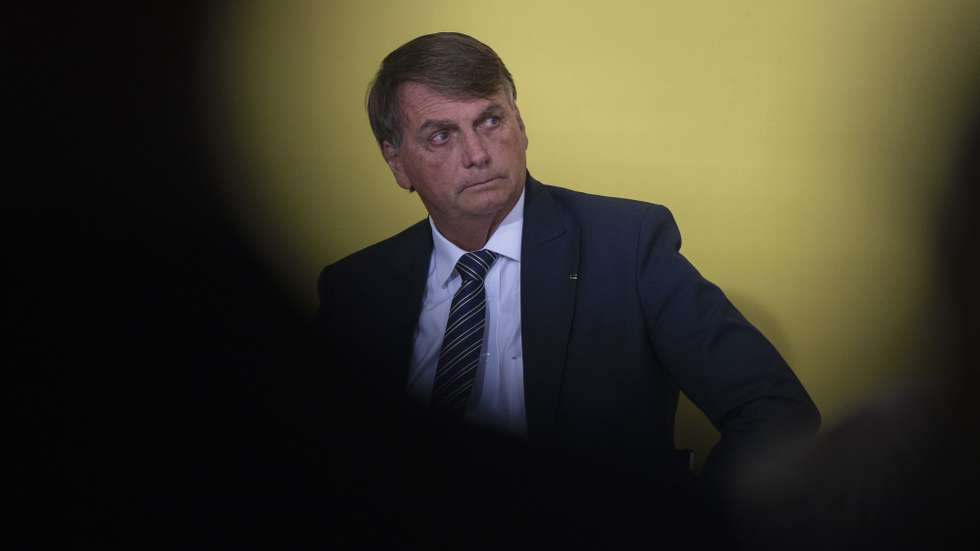 epa09849213 The president of Brazil, Jair Bolsonaro, participates in a ceremony for the Launch of New Deliveries of the Income and Opportunity Program at the Palacio do Planalto, in Brasilia, Brazil, 25 March 2022.  EPA/Joedson Alves