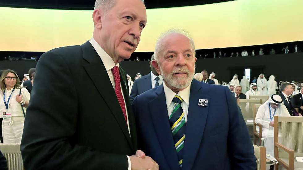 epa11005816 A handout photo made available by Turkish Presidential Press office shows Turkish President Recep Tayyip Erdogan (L) and President of Brazil, Luiz Inacio Lula da Silva during the UN Climate Change Conference COP28, in Dubai, United Arab Emirates, 01 December 2023. The 2023 United Nations Climate Change Conference (COP28), runs from 30 November to 12 December, and is expected to host one of the largest number of participants in the annual global climate conference as over 70,000 estimated attendees, including the member states of the UN Framework Convention on Climate Change (UNFCCC), business leaders, young people, climate scientists, Indigenous Peoples and other relevant stakeholders will attend. HANDOUT EDITORIAL USE ONLY/NO SALES  EPA/MURAT CETINMUHURDAR /TURKISH PRESIDENTIAL PRESS OFFICE /HANDOUT  HANDOUT EDITORIAL USE ONLY/NO SALES HANDOUT EDITORIAL USE ONLY/NO SALES
