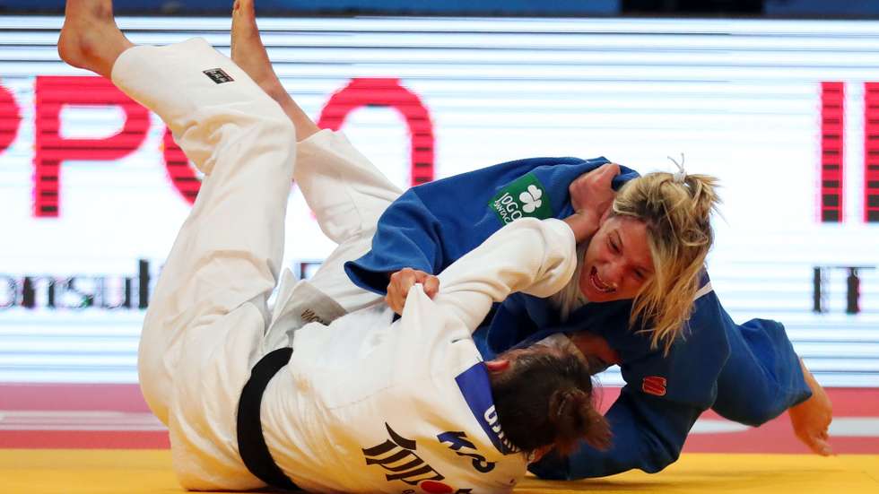 Telma Monteiro of Portugal ( blue) wins with an ippon against Nora Gjakova of Kosovo (white) during the semi-finals match in the woman's -57kg category at the European Judo Championships in Lisbon, Portugal, 16 April 2021. NUNO VEIGA/LUSA