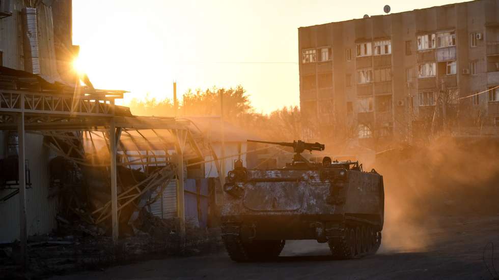 epaselect epa10431491 An APC drives threw  retaken town Lyman Donetsk region, eastern Ukraine, 26 January 2023.
Lyman was re-captured by Ukraine armed forces in October.  Before the beginning of active combat action population of Lyman was around 41000. After being under Russian occupation, without electricity, water and gas supply, infrastructure is slowly renewing. Russian troops entered Ukraine on 24 February resulting in fighting and destruction in the country and triggering a series of severe economic sanctions on Russia by Western countries.  EPA/OLEG PETRASYUK