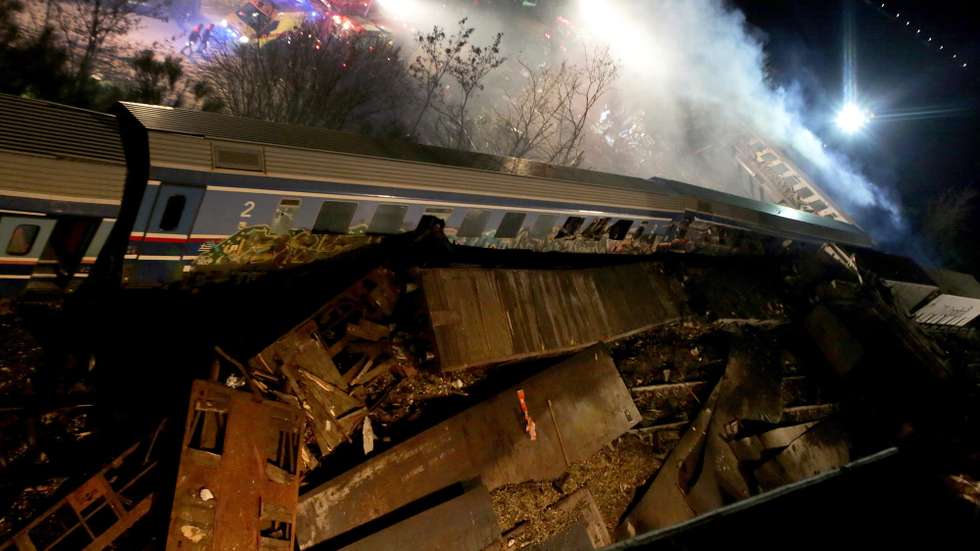 epa10496179 Firefighters and rescue crews work to extricate passengers from trains after a coallision near Larissa city, Greece, 01 March 2023. The two trains – a passenger train travelling from Athens to the northern city of Thessaloniki, and a cargo train from Thessaloniki to Larissa, collided head-on outside the central Greek city, Konstantinos Agorastos, the governor of the Thessaly region told local media. Sixteen people have been killed and at least 85 injured, and 250 passengers were evacuated safely to Thessaloniki on buses.  EPA/APOSTOLIS DOMALIS