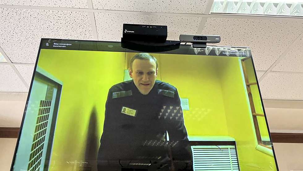 epa10664633 A handout photo made available by Moscow City court press service shows jailed Russian opposition figure Alexei Navalny attending via a video link from his penal colony a preliminary hearing of a new case in the Moscow City court in Moscow, Russia, 31 May 2023. A new case was initiated under six articles - on the organization of an extremist community. Navalny has been in the colony since February 2021, when the court, at the request of the Federal Penitentiary Service, replaced his suspended sentence in the Yves Rocher case of 2014 with a real one. He was supposed to serve in a penal colony for 2 years and 8 months, but in March 2022, the Lefortovo Court of Moscow, at an off-site meeting in correctional colony-2 in the city of Pokrov, Vladimir Region, sentenced the politician to 9 years of strict regime and a fine of 1.2 million rub., as well as one and a half years of restriction of freedom in the case of fraud and contempt of court. In June 2022, the sentence entered into force.  EPA/MOSCOW CITY COURT PRESS SERVICE/HANDOUT -- BEST QUALITY AVAILABLE -- HANDOUT EDITORIAL USE ONLY/NO SALES