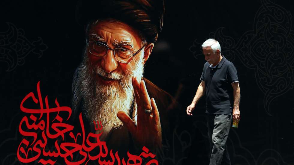 epaselect epa13082608 An Iranian man walks in front of a billboard of late Iranian Supreme Leader Ayatollah Ali Khamenei ahead of his funeral ceremonies in Tehran, Iran, 03 July 2026. Iran is set to hold a multi-day state funeral from 04 to 09 July for Khamenei, who was killed in a joint US and Israeli airstrike on 28 February.  EPA/ABEDIN TAHERKENAREH RESTRICTIONS: NO Access Israel Media/Persian Language TV Stations Outside Iran/Strictly No Access BBC Persian/VOA Persian/Manoto TV/Iran International TV. (As mandated by Iran's Directorate General for Foreign Media) --