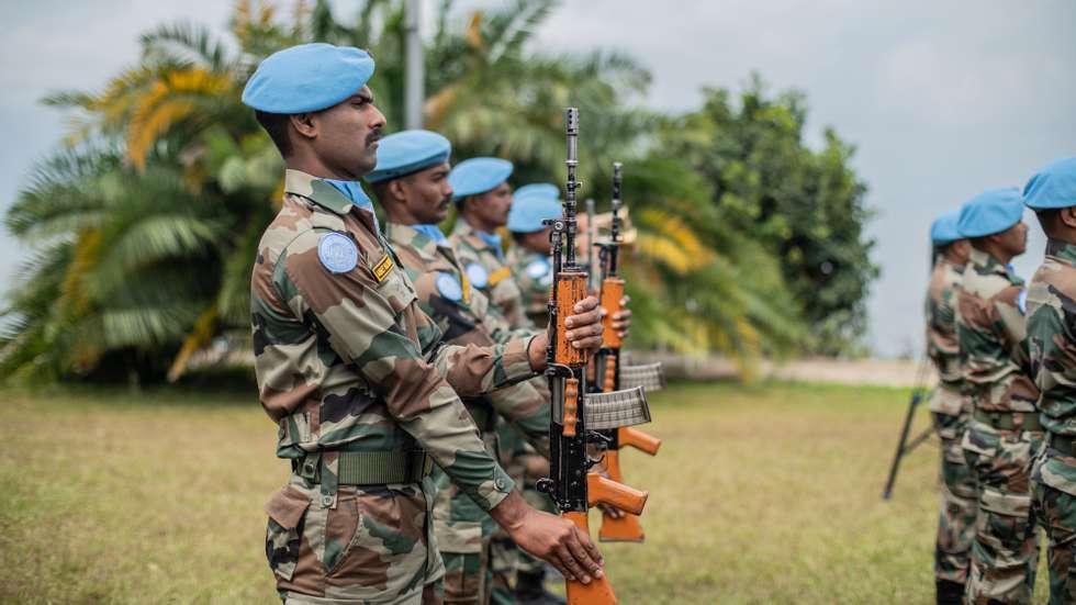 epa10101378 United Nations (UN) personnel during a ceremony to pay tribute to UN peacekeepers killed during a protest in Butembo in Goma, Democratic Republic of Congo (DRC), 01 August 2022. The tribute ceremony was for UN peacekeepers that were killed during anti-UN protests in eastern Democratic Republic of Congo following more than a week of protests against the UN peacekeeping mission in DRC, Monusco.  The UN Under-Secretary-General for Peace Operations Jean-Pierre Lacroix attended the ceremony. The ceremony comes one day following UN peacekeepers allegedly opening fire and killing two residents in Kasindi, a border town with Uganda.  EPA/STR