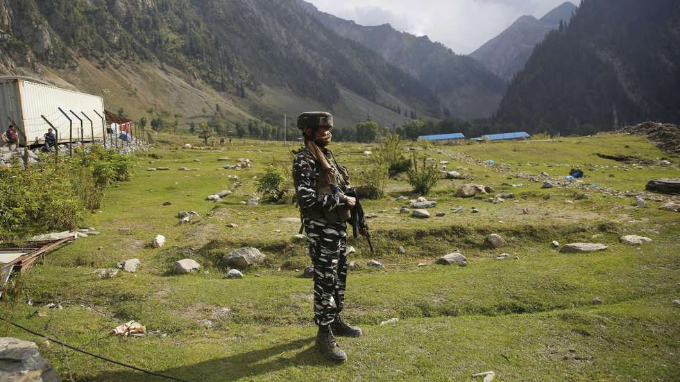 epa09492724 An Indian paramilitary soldier stands guard outside the tunnel during the visit of Minister for Road Transport and Highways, Nitin Gadkari (not pictured), at Zojila tunnel on Srinagar-Ladakh highway in Zojila, some 100 kilometers from Srinagar, the summer capital of Indian Kashmir, 28 September 2021. Once completed the Zojila tunnel will be India’s longest road tunnel and Asia’s longest bi-directional tunnel and will make Srinagar-Ladakh highway an all-weather road.  EPA/FAROOQ KHAN