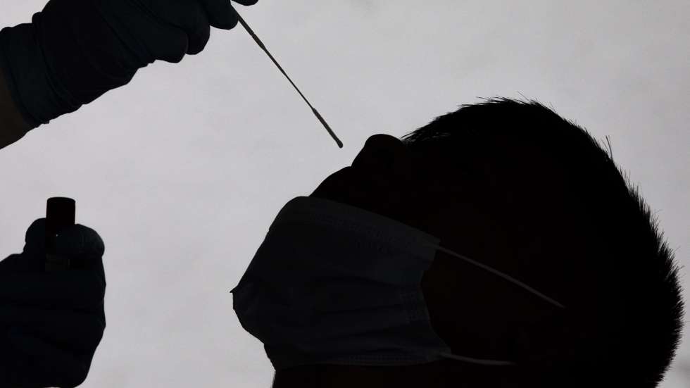 epaselect epa09393898 A health worker collects a nose swab sample for a PCR test amid the new mutant of the Delta Covid-19 variant at Sukraraj Tropical and Infectious Disease Hospital in Kathmandu, Nepal, 04 August 2021. Kathmandu District Administration urged the residents of Kathmadu to avoid gatherings that may lead to overcrowding such as protests, rallies, conventions, meetings to prevent from the new mutant of the Delta COVID-19 variant.  EPA/NARENDRA SHRESTHA
