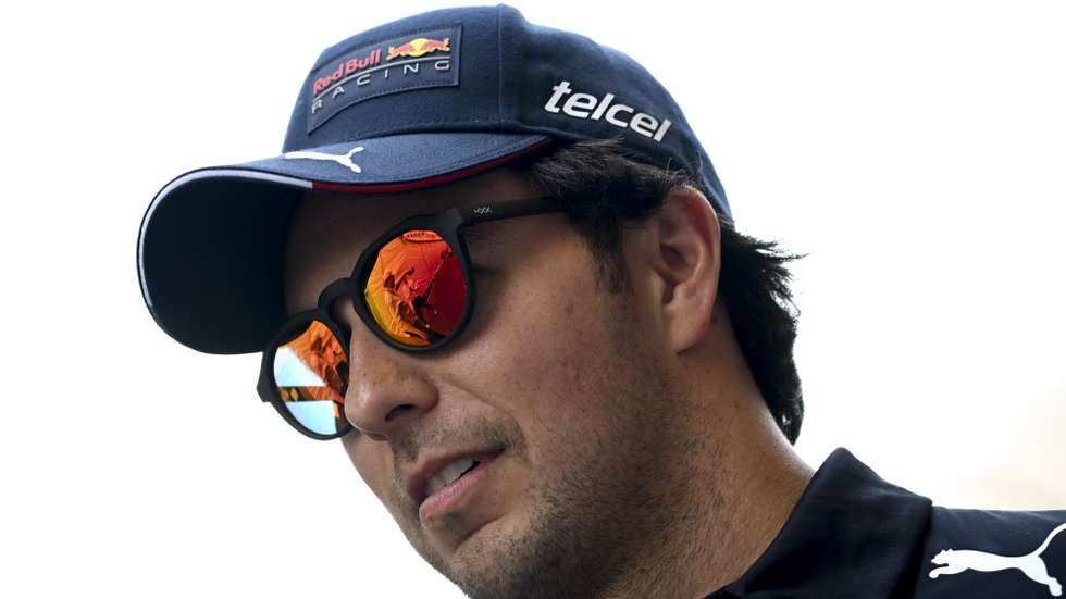 epa09983915 Mexican Formula One driver Sergio Perez of Red Bull Racing reacts prior to the start of the Formula One Grand Prix of Monaco at the Circuit de Monaco in Monte Carlo, Monaco, 29 May 2022.  EPA/CHRISTIAN BRUNA