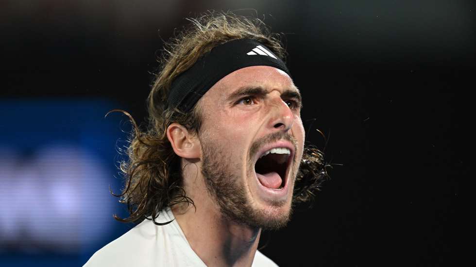 epa10426527 Stefanos Tsitsipas of Greece reacts during his quarter final match against Jiri Lehecka of the Czech Republic at the Australian Open tennis tournament in Melbourne, Australia 24 January 2023.  EPA/LUKAS COCH AUSTRALIA AND NEW ZEALAND OUT