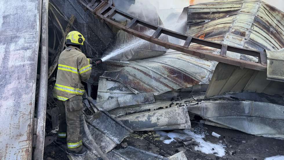 epa13289547 A handout picture made available by the State Emergency Service shows emergency personnel working at the site of a Russian strike on a civilian warehouse in Kyiv, Ukraine, 08 October 2026, amid the ongoing Russian invasion. At least three people were killed in the Russian attack, according to the State Emergency Service report.  EPA/STATE EMERGENCY SERVICE HANDOUT HANDOUT  HANDOUT EDITORIAL USE ONLY/NO SALES