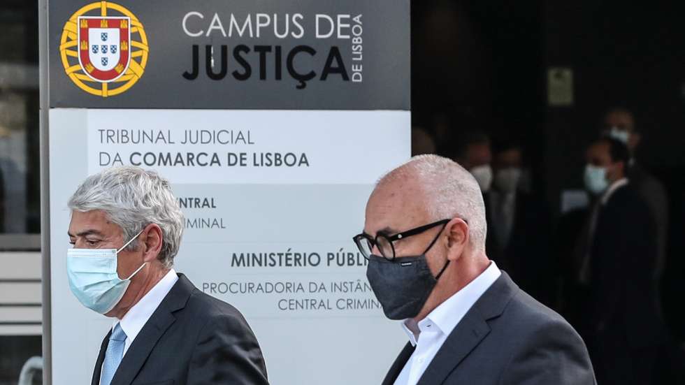 epa09125086 The defendant and former Prime Minister Jose Socrates (L) and his lawyer Pedro Delille (R) leave the court after the reading of the instructional decision of the high-profile corruption case known as Operation Marques, at the Justice Campus in Lisbon, Portugal, 09 April 2021. Operation Marques has 28 defendants - 19 people and 9 companies - including former Prime Minister Jose Socrates, banker Ricardo Salgado, businessman and friend of Socrates Carlos Santos Silva, and senior executives of Portugal Telecom, and is related to crimes of active and passive corruption, money laundering, document forgery, and tax fraud.  EPA/ANTONIO COTRIM