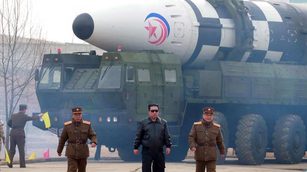 epaselect epa09848041 A photo released by the official North Korean Central News Agency (KCNA) shows Kim Jong Un (C), general secretary of the Workers' Party of Korea, president of the State Affairs of the Democratic People's Republic of Korea (DPRK), and supreme commander of the armed forces of the DPRK, Jang Chang-ha (L rear), Chief of the North's Academy of National Defense, and Kim Jong-sik (R), the Deputy Director of the Munitions Industry Department, during the test-launch of a new type of inter-continental ballistic missile Hwasongpho-17 of the DPRK strategic forces that was conducted on 24 March 2022 (issued 25 March 2022).  EPA/KCNA   EDITORIAL USE ONLY