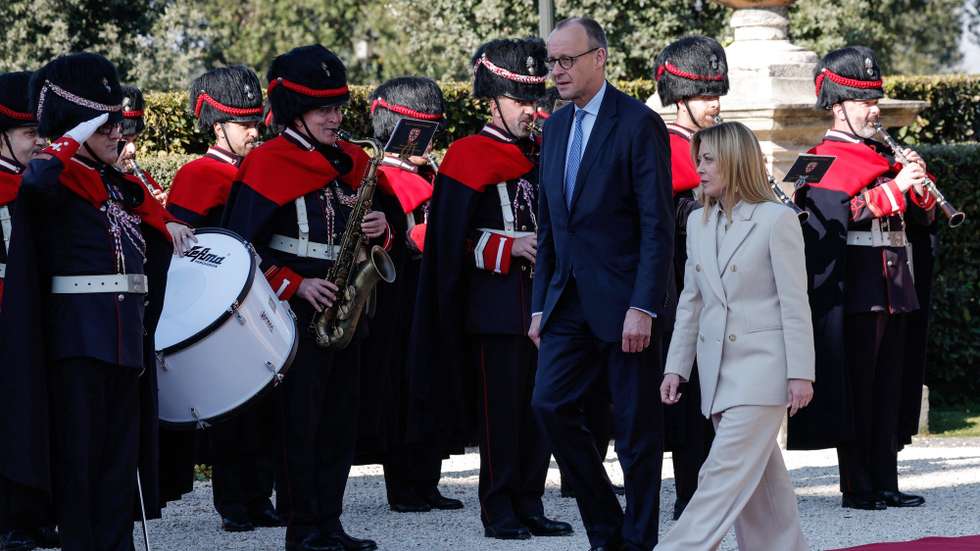 epa12674345 Italian Prime Minister Giorgia Meloni (R) and German Chancellor Friedrich Merz (C) attend an Italy-Germany intergovernmental meeting at Villa Doria Pamphilj in Rome, Italy, 23 January 2026.  EPA/GIUSEPPE LAMI