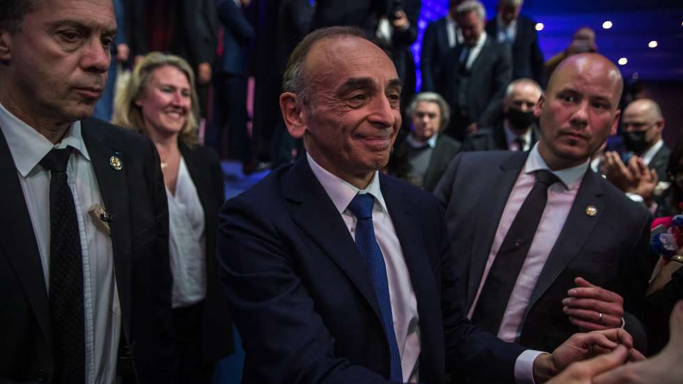 epa09883486 France's far-right party 'Reconquete!' leader and candidate to the 2022 presidential election Eric Zemmour (C) greets his supporters after delivering a speech after the announcement of the results in the first round of the French presidential elections in Paris, France, 10 April 2022. Zemmour received around seven percent of votes.  EPA/CHRISTOPHE PETIT TESSON