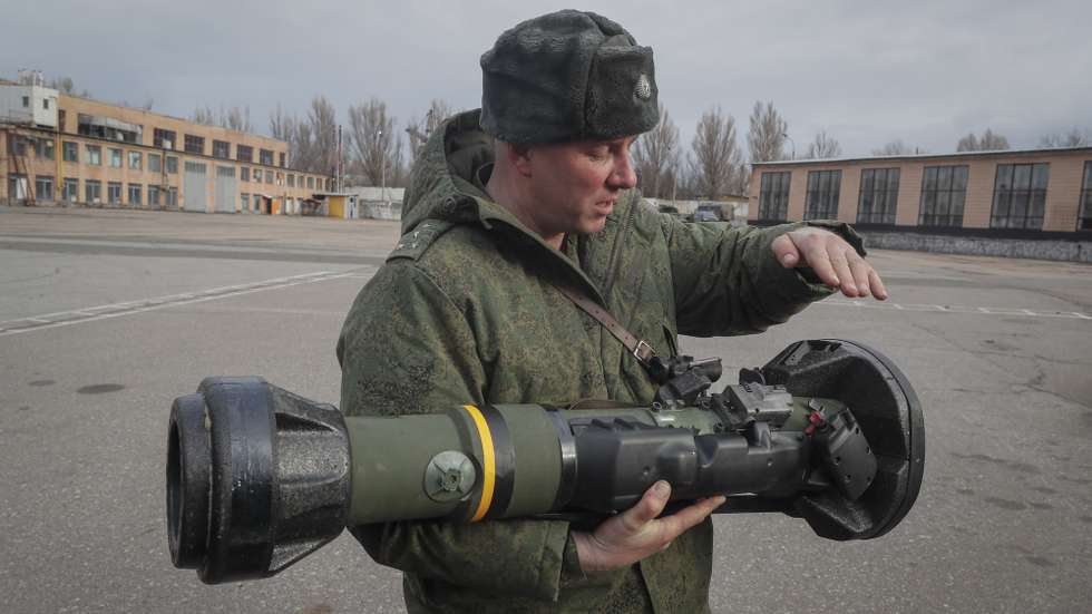 epa09853406 A serviceman of the self-proclaimed Luhansk People's Republic (LPR) shows NLAW Swidish-UK made Light Anti-tank weapon that was abandoned by Ukrainian army during their retreat in Luhansk region, in Luhansk, Ukraine, 27 March 2022. Over the past two weeks, the US has donated $300 million worth of military aid to Ukrainians. Canada and the UK have said they will continue to supply arms to Ukraine. On 24 February Russian troops had entered Ukrainian territory in what the Russian president declared a 'special military operation', resulting in fighting and destruction in the country, a huge flow of refugees, and multiple sanctions against Russia.  EPA/SERGEI ILNITSKY