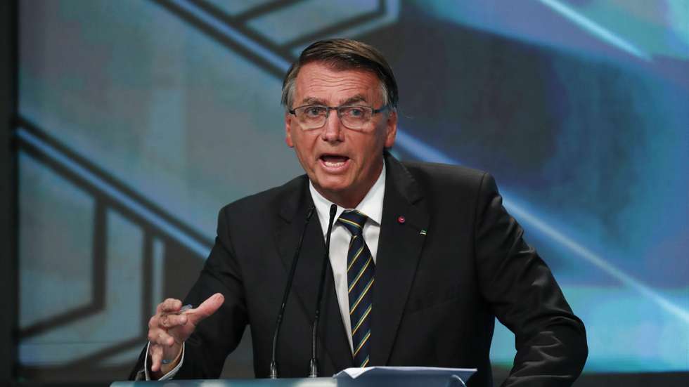 epa10204688 Brazilian President Jair Bolsonaro speaks during a presidental electoral debate, at the headquarters of the television channel SBT in Sao Paulo, Brazil, 24 September 2022. Former Brazilian president Luiz InÃ¡cio Lula da Silva, favorite for the 02 October 2022 elections, did not attend the second debate between the presidential candidates this Saturday, who harshly criticized his absence.  EPA/Sebastiao Moreira