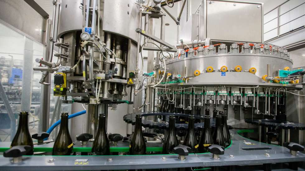 epa05699833 Beer bottles are filled with pipettes at the 'Dubuisson' familial brewery in Leuze-en-Hainaut, Belgium, 05 January 2017. The familial brewery, located in Leuze-en-Hainaut, produces beers since 1769 and is now the oldest brewery in Wallonia. Belgium beer culture was inscribed on the UNESCO Representative List of the Intangible Cultural Heritage of Humanity in 2016. Almost one and a half thousand kinds of craft beer with different fermentation methods are produced in Belgium.  EPA/STEPHANIE LECOCQ