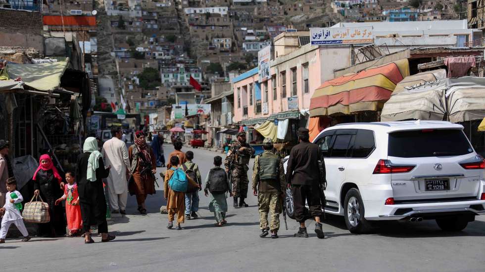epa10104243 Taliban stand guard near the scene of an operation against the IS militants in Kabul, Afghanistan, 03 August 2022. Gunmen have engaged in clashes with Taliban security forces in the Karta-e-Sakhi area of Kabul city. Earlier Kabul security department spokesman Khalid Zadran said security forces were conducting a clearing operation when gunfire came from a house, after which a security operation was launched to clear the area.  EPA/STRINGER