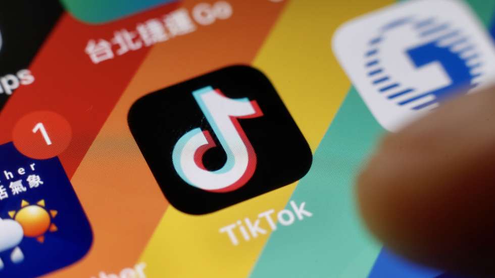 epa10351130 The Tiktok application logo is pictured on a smartphone in Taipei, Taiwan, 06 December 2022. On 02 December, the The US Federal Bureau of Investigation (FBI) warned about Tiktok, that it presents national security concerns in regards to the integrity of the application's algorithm. On 05 December, a Ministry of Digital Affairs (MODA) official announced that the application have been deemed to be 'harmful product against national information security.'  EPA/RITCHIE B. TONGO