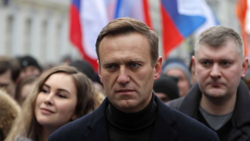 epa08667732 (FILE) - Russian opposition leader and anti-corruption activist Alexei Navalny (C) takes part in a memorial march for Boris Nemtsov marking the fifth anniversary of his assassination in Moscow, Russia, 29 February 2020 (reissued 14 September 2020). The German government spokesperson on 14 September 2020 said laboratories in France and Sweden have confirmed that Navalny was poisoned with a nerve agent from the Novichok group. Navalny is treated at the Charite hospital in Berlin since 22 August 2020. He was first placed in an hospital in Omsk, Russia, after he felt bad on board of a plane on his way from Tomsk to Moscow. The flight was interrupted and after landing in Omsk Navalny was delivered to hospital with a suspicion on a toxic poisoning.  EPA/YURI KOCHETKOV  EPA-EFE/YURI KOCHETKOV