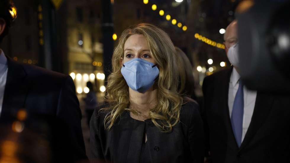 epa09665291 Elizabeth Holmes, founder of Theranos  departs the Robert F. Peckham Federal Building and US Courthouse after being found guilty on four counts and acquitted on four counts in San Jose, California, USA, 03 January 2022. The jury also deadlocked on three other charges against CEO Elizabeth Holmes, and Theranos, her failed blood-testing technology start-up company.  EPA/PETER DASILVA
